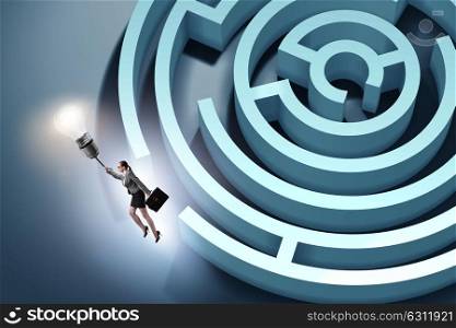 Businesswoman escaping from maze on balloon. The businesswoman escaping from maze on balloon