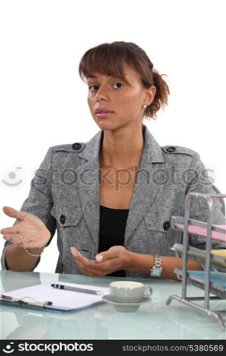 businesswoman explaining and gesturing with her hands