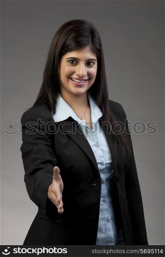 Businesswoman extending her hand