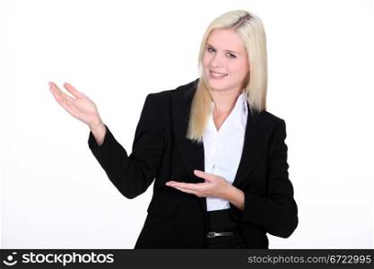 Businesswoman gesturing at copyspace