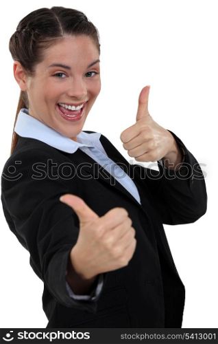 Businesswoman giving two thumb&rsquo;s up
