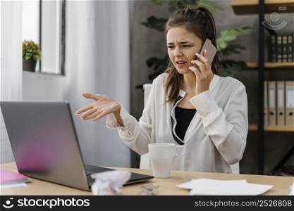 businesswoman having bad call from work