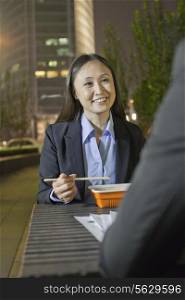 Businesswoman Having Dinner With Male Colleague