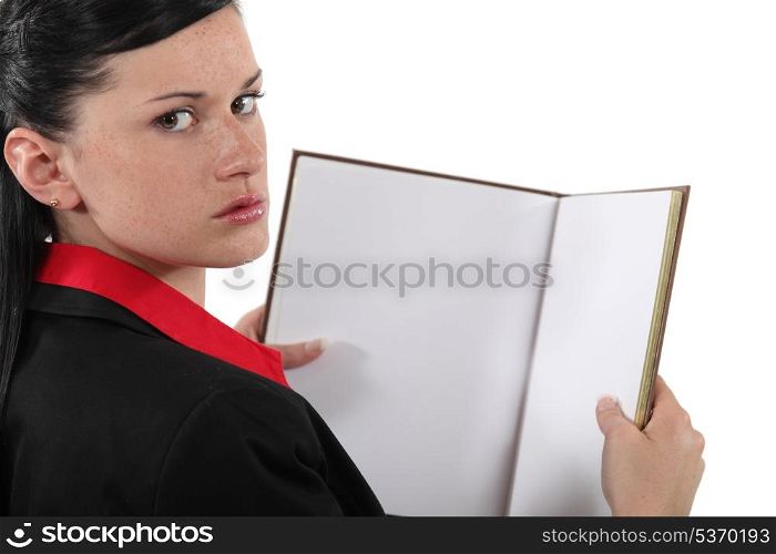 businesswoman holding a book