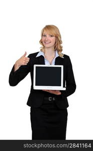 Businesswoman holding a laptop and giving the thumb&acute;s up