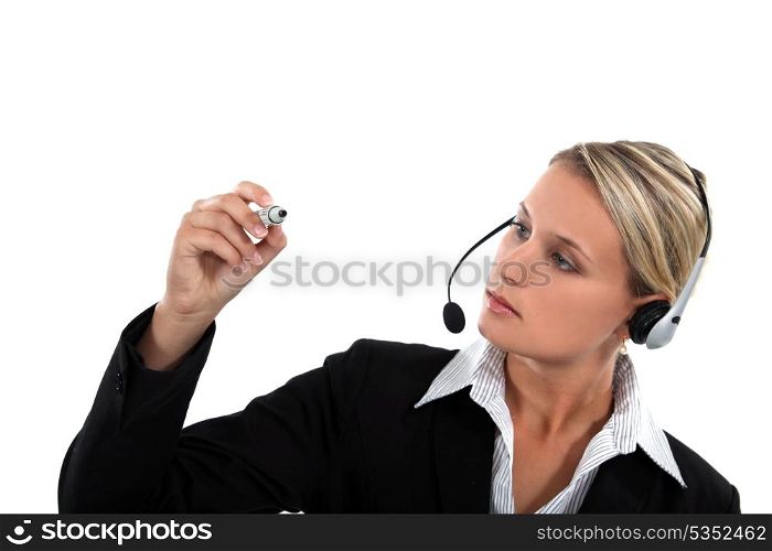 businesswoman holding a marker pen