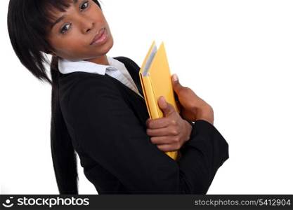 Businesswoman holding a notepad