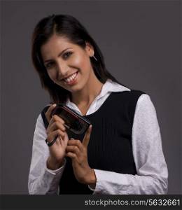 Businesswoman holding a phone