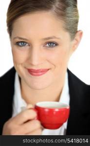 Businesswoman holding coffee mug