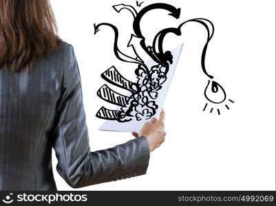 Businesswoman holding documents. Rear view of businesswoman with papers in hand