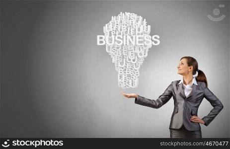Businesswoman holding in hands successful idea concept. Woman presenting idea