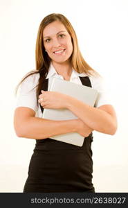 Businesswoman holding laptop, smiling, portrait
