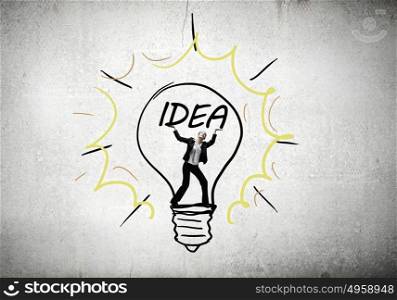 Businesswoman holding luminous idea inside light bulb. Creativity woman