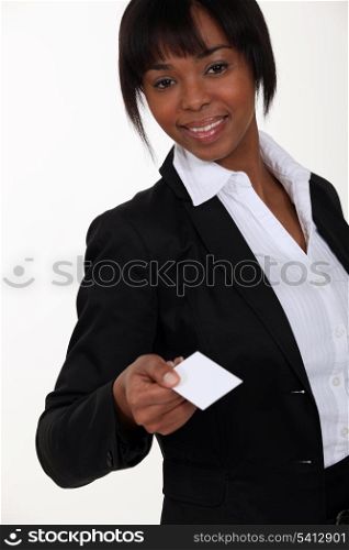 Businesswoman holding out card