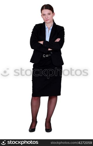 businesswoman in a suit posing
