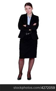 businesswoman in a suit posing