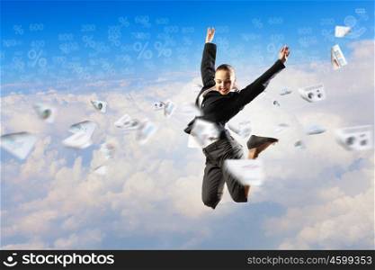businesswoman in black suit jumping. pretty businesswoman jumping high against diagram background