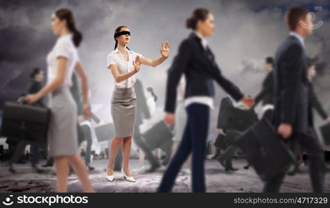 Businesswoman in blindfold among group of people. Image of businesswoman in blindfold walking among group of people