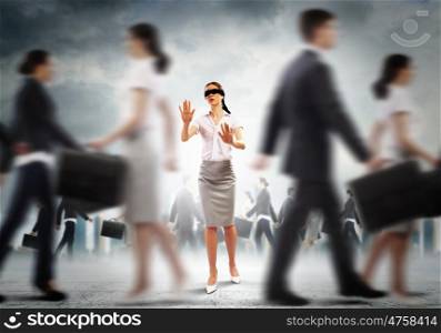 Businesswoman in blindfold among group of people. Image of businesswoman in blindfold walking among group of people
