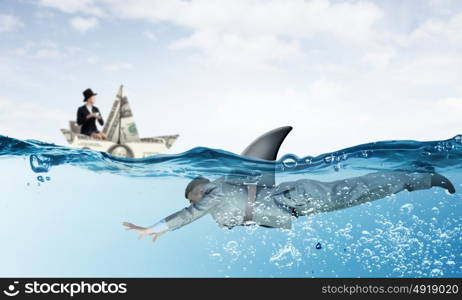 Businesswoman in boat made of dollar banknote. Successful businesswoman sailing on dollar boat in financial sea and shark businessman underwater