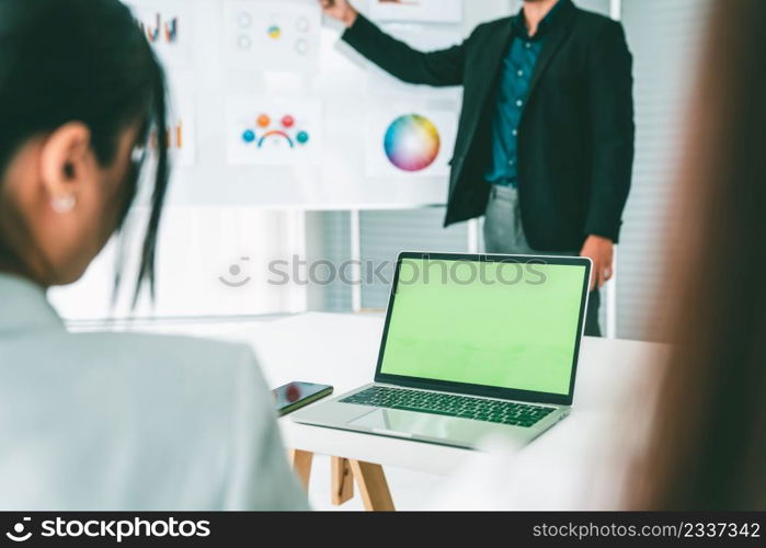 Businesswoman in business meeting using computer proficiently at office room . Corporate business team collaboration concept .. Businesswoman in business meeting using computer proficiently at office room .