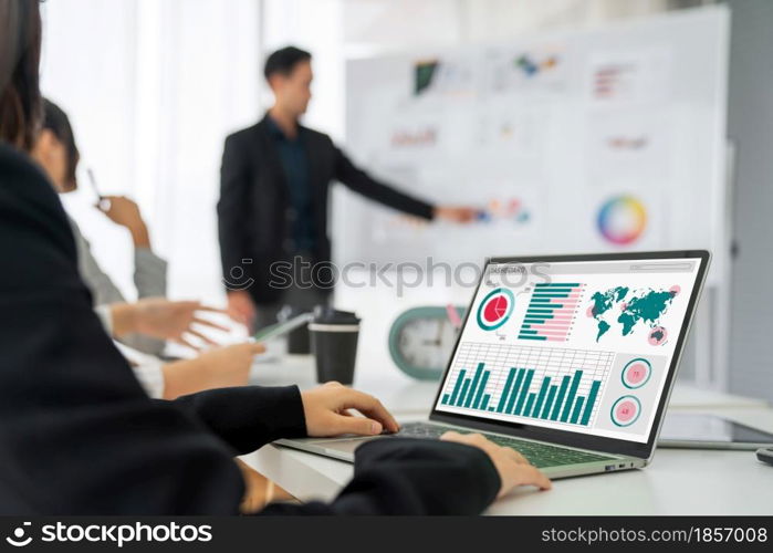 Businesswoman in business meeting using laptop computer proficiently at office for marketing data analysis . Corporate business team collaboration concept .. Business Data