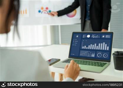 Businesswoman in business meeting using laptop computer proficiently at office for marketing data analysis . Corporate business team collaboration concept .. Business Data