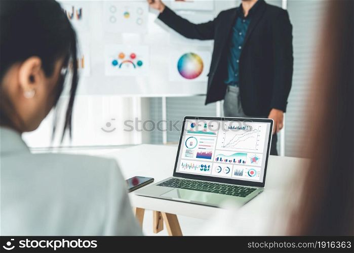 Businesswoman in business meeting using laptop computer proficiently at office for marketing data analysis . Corporate business team collaboration concept .. Business Data