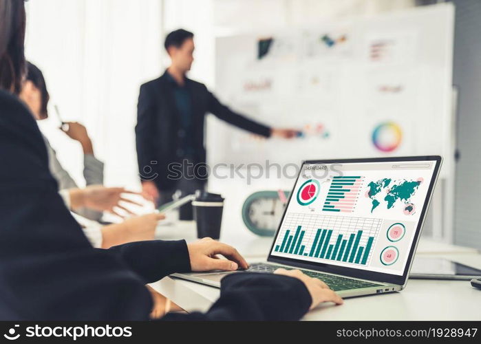 Businesswoman in business meeting using laptop computer proficiently at office for marketing data analysis . Corporate business team collaboration concept .. Business Data