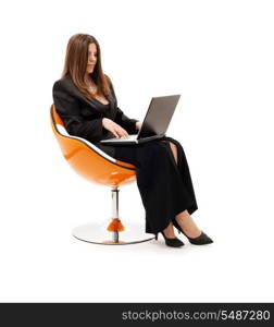 businesswoman in chair with laptop computer over white