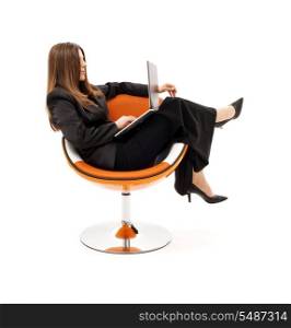 businesswoman in chair with laptop computer over white