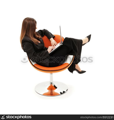 businesswoman in chair with laptop computer over white