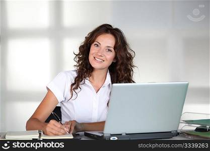 Businesswoman in front of computer in the office