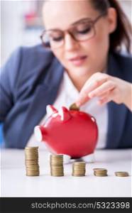 Businesswoman in pension savings concept. The businesswoman in pension savings concept