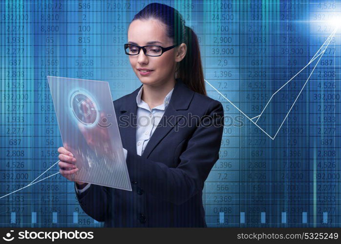 Businesswoman in stock exchange trading concept