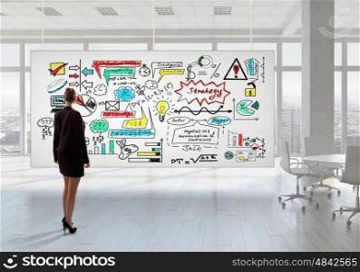 Businesswoman in top floor office. Elegant businesswoman in modern office interior against window panoramic view looking at banner