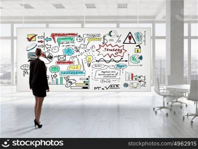 Businesswoman in top floor office. Elegant businesswoman in modern office interior against window panoramic view looking at banner