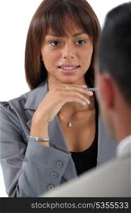 Businesswoman interviewing an applicant