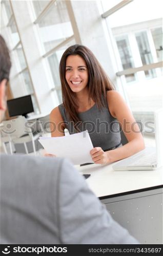 Businesswoman interviewing job applicant