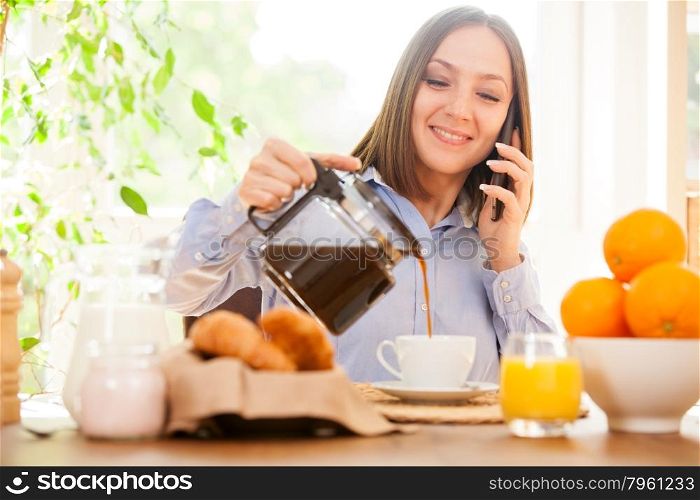 Businesswoman is having a breakfast