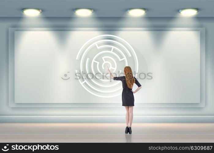 Businesswoman is looking for ways to escape from maze labyrinth