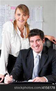 businesswoman is sitting on table at office with her boss in chair
