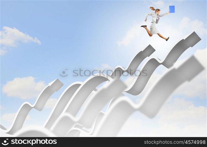 Businesswoman jumping. Young businesswoman jumping on white arrows. Growth concept