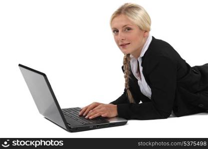 Businesswoman laid in front of computer