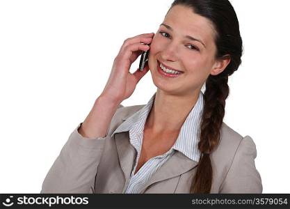 Businesswoman laughing on a mobile phone