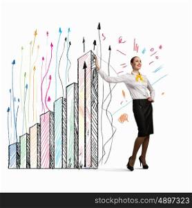 Businesswoman leaning on bars. Image of businesswoman leaning on graphs and bars
