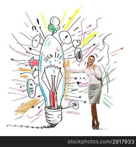 Businesswoman leaning on bulb