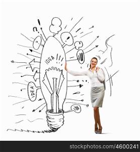 Businesswoman leaning on bulb. Image of businesswoman leaning on bulb. Idea concept