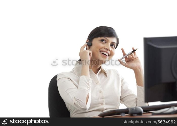 Businesswoman looking away while speaking on call