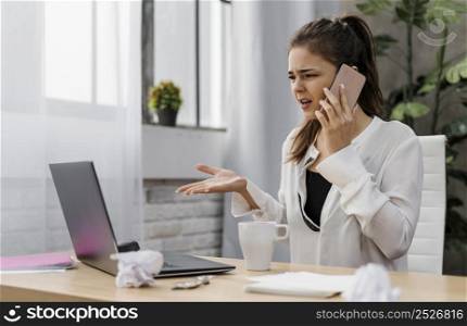 businesswoman looking frustrated while having call 2